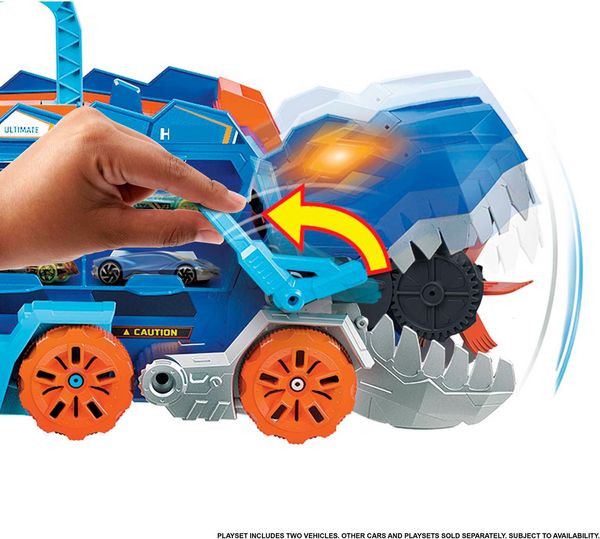 Produktbild: Der Hot Wheels City Ultimative Transporter verwandelt sich in einen T-Rex mit Rennstrecke, Aufbewahrung von mehr als 20 Autos