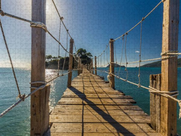 Produktbild: CALVENDO Puzzle Zur kleinen Insel "Agios Sostis" f&uuml;hrt im Sommer ein langer Steg | 1000 Teile Lege-Gr&ouml;&szlig;e 64x48cm Foto-Puzzle f&uuml;r gl&uuml;ckliche Stunden