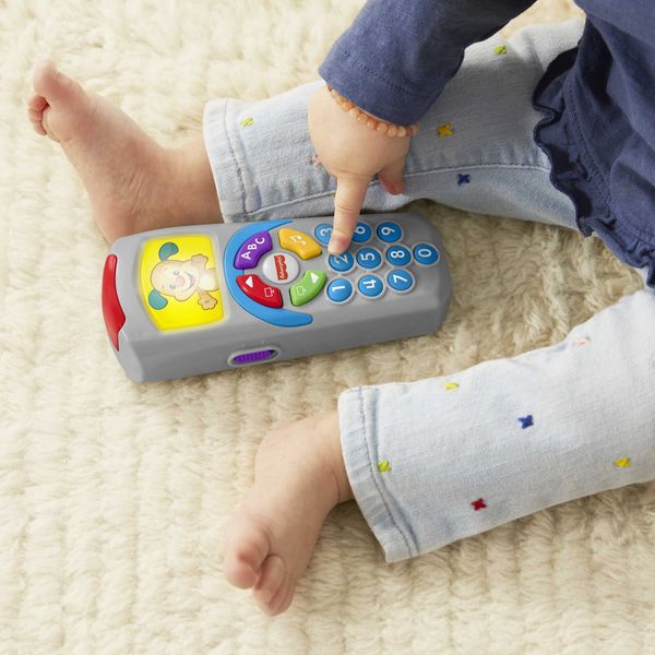 Produktbild: Fisher-Price Lernspa&szlig; H&uuml;ndchen-Fernbedienung Lernspielzeug f&uuml;r Babys und Klein
