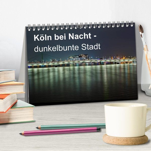 Produktbild: K&ouml;ln bei Nacht - dunkelbunte Stadt (Tischkalender 2026 DIN A5 quer), CALVENDO Monatskalender