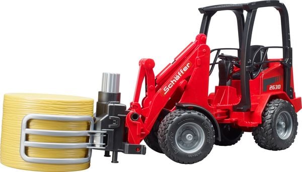 Produktbild: bruder 02192 Sch&auml;ffer Hoflader 2630 mit Ballengreifzange + Rundballen