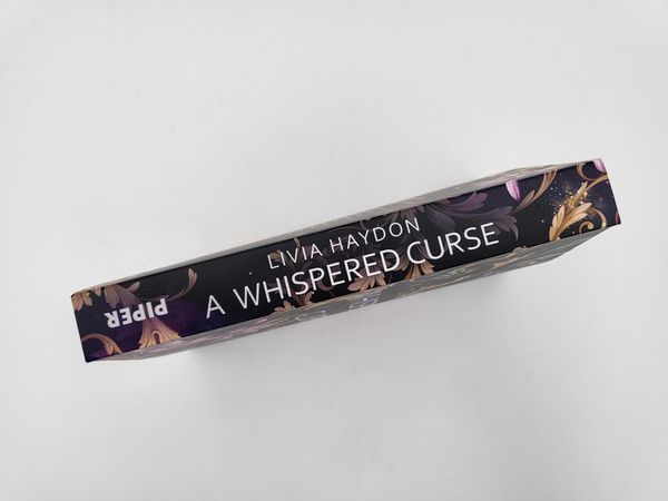 Produktbild: A Whispered Curse