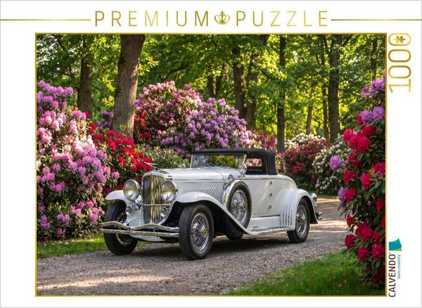 CALVENDO Puzzle Duesenberg Model J Convertible Coupe (USA, 1929-35) auf einem Parkweg mit prächtigen Rhododendren | 1000 Teile Lege-Größe 64 × 48 cm Foto-Puzzle für glückliche Stunden