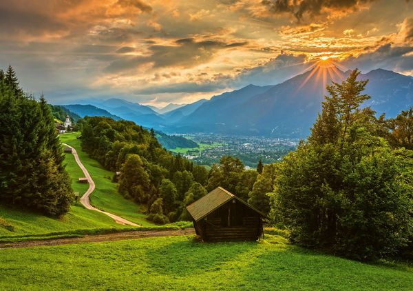 Produktbild: Sonnenuntergang &uuml;ber dem Bergdorf Wamberg (Puzzle)
