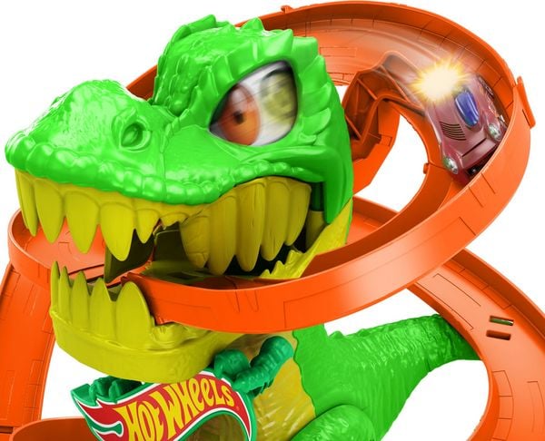 Produktbild: Hot Wheels City T-Rex-Feuerschlacht Spielset und Die-Cast-Spielzeugauto im Maßstab 1:64, gegnerischer Dinosaurier