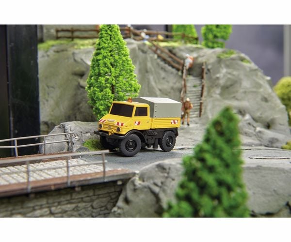 Carson Modellsport 500504146 MB Unimog U406 Zweiwegefahrzeug 1:87 RC Modell-LKW Elektro Straßenmodell inkl. Akku, Ladegerät und Senderbatterien