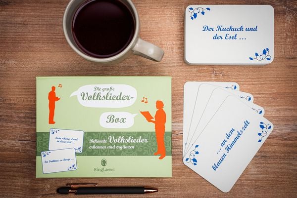 Produktbild: Die gro&szlig;e Volkslieder-Quiz-Box f&uuml;r Senioren. Das Spiel rund um bekannte Volkslieder f&uuml;r Senioren. Auch mit Demenz. Spiele Box mit 100 Karten.