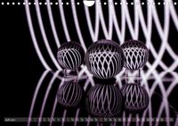 Glaskugeln im Licht - faszinierende Lightpaintings (Wandkalender 2023 DIN A4 quer)