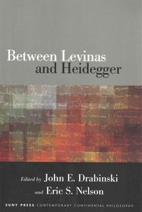 Produktbild: Between Levinas and Heidegger